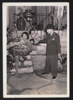 Martha Raye and Theodore Reed on the set of Tropic Holiday