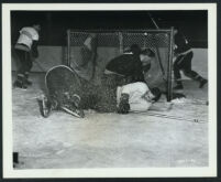 Stanley Clements and other hockey players in a scene from White Lightning