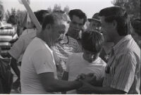 Cesar E. Chavez with farmworkers at an event in the Coachella Valley
