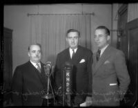 Mayor Frank L. Shaw, Henry S. McKay, Jr. and Fred W. Marlow discuss the federal Better Housing campaign on the KMPC radio station, Los Angeles, 1934
