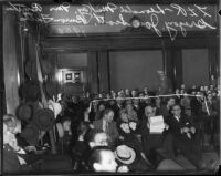 District Attorney Buron Fitts and his sister-secretary Berthal Gregory with their attorneys during trial, Los Angeles, 1934