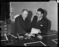 Judge William R. McKay and Judge Cecil D. Holland reenact traffic scene, Los Angeles, 1930s