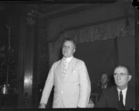 Judge James Francis Thaddeus O'Connor stands next to congressman Thomas Francis Ford while wearing a suit, Los Angeles, 1930s