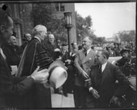 President Franklin D. Roosevelt and Eleanor Roosevelt make a stop during their motorcade across the city, Los Angeles, 1935