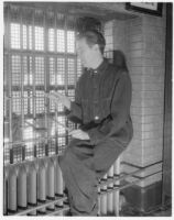 Murder suspect Robert S. James in his jail cell, Los Angeles, 1936