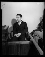 Hal Takaoka, brother of a slain dancer, testifying on the witness stand, Los Angeles, 1936