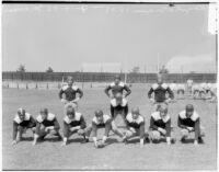 Members of the Loyola University football team in snap formation, Los Angeles, 1936