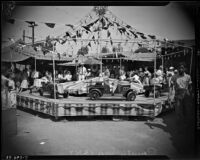 Merry-go-around at the county fair, Los Angeles, 1936