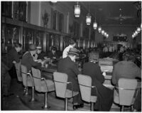 Gamblers sit and play tango, a bingo-like game, Venice, 1930s