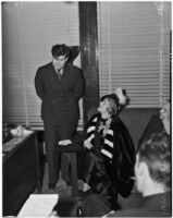 Evangelist Aimee Semple McPherson and attorney Joe Fainer during a trial, Los Angeles, 1937