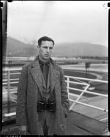 Tom Gwynee, sportswriter for Copley Press Newspapers, at Santa Anita Racetrack, Arcadia, 1930s