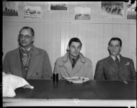 Sportswriters Jack James, Bob Meyer and Howard Durham at Santa Anita Racetrack, Arcadia, 1930s