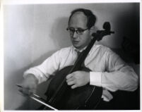 Mstislav Rostropovich playing the cello, 1956 [descriptive]