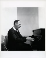 Jascha Heifetz playing the piano, 1966 [descriptive]