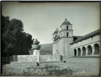 Mission Santa Barbara, view towards front of mission with fountain and pepper trees, Santa Barbara, 1898