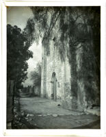 Mission San Gabriel Arcangel, view towards east facade and cemetery wall, San Gabriel, circa 1900