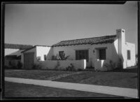 Exterior view of an unidentified Spanish style house, California
