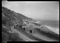 View of beach houses along the California coast near Las Flores Canyon, Malibu, circa 1920