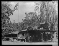 Grocery store and gas station in mountain or rural location (unidentified), California, circa 1915-1930