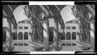 Unidentified building with reflecting pool in courtyard, arcade, and loggia, California, circa 1915-1934