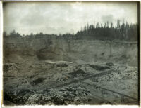 Hydraulic mining operation in an open pit in a mountain area (unidentified), California, circa 1880-1900