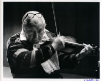 Isaac Stern playing the violin, 1986 [descriptive]