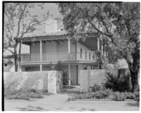 Rancho Los Cerritos, view from forecourt of towards the restored house, wall and gate, Long Beach, 1931