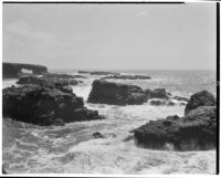 Pacific Ocean waves crash into outcrops near the coast, Ensenada, 1926