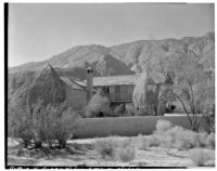 Bettye K. Cree studio, view towards garden wall, palapas and studio, Palm Springs, 1929