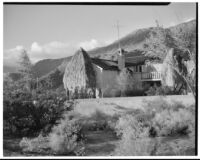 Bettye K. Cree studio, view towards garden wall, palapas and studio, Palm Springs, 1930