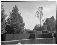 Wright Saltus Ludington residence, hedges and trees surrounding oval reflecting pool, Montecito, 1931