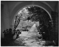Allied Arts Guild of California, view from arch looking down walkway, Menlo Park, 1932
