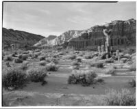 View across desert towards the scenic desert cliffs in Red Rock Canyon State Park, California, 1924