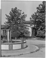 Leo V. Youngworth residence, view across entry court towards tiled fountain and house, Baldwin Hills, 1932