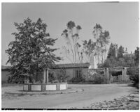 Leo V. Youngworth residence, view across entrance court with tiled fountain towards house and pergola, Baldwin Hills, 1932