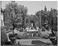 Dr. and Mrs. P. G. White residence, view of reflecting pool and statue garden, Los Angeles, 1933-1938