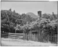 Fenced area with arbor, Channel Islands, 1934