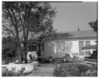 Exterior view of the Mr. and Mrs. Byron F. Hill residence and patio, Los Angeles, 1937