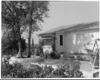 Exterior view of the Mr. and Mrs. Byron F. Hill residence and patio, Los Angeles, 1937