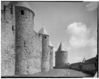 Grassy area between the ramparts and towers in the fortified town of Carcassonne, France, 1929