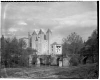 River, stone arch bridge and chateau, France, 1929