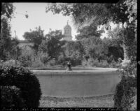 Gardens at the Palacio de la Casa de Viana, view of a fountain, Córdoba, Spain, 1929
