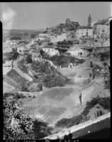 Buildings on a hillside, view from above, Loja, Spain, 1929