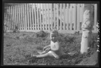 Baby Rosita Dee Cornell sitting outside in a diaper, California, 1932