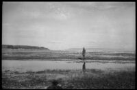 Man standing on shore of Mono Lake, Mono County, [1929?]