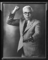 Portrait of Dr. St. Louis Albert Estes with his fist raised, between 1933 and 1936