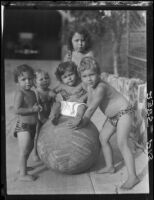 Five Estes children with an exercise ball in a yard, [Van Nuys?], between 1928 and 1936