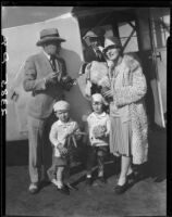 Dr. St. Louis Albert and Esther Estes with two children next to a trailer, between 1928 and 1936