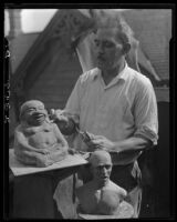 Frank Silsby with buddha and bust, Los Angeles, 1927