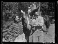 Sally Phipps, unidentified man, and horses, Lake Arrowhead, 1929